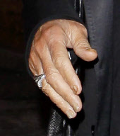 Al Pacino shows his gnarly fingernails while dining with Lucila Sola
