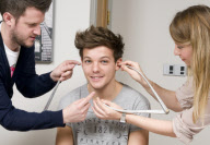 One Direction get measured for waxwork model of themselves, Madame Tussauds, London, Britain  - 11 Mar 2013