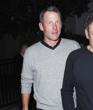 Lance Armstrong pretending everying is okay after being stripped of his medals