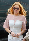 Lindsay Lohan arrives at her trial nearly an hour late
