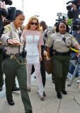 Lindsay Lohan arrives at her trial nearly an hour late