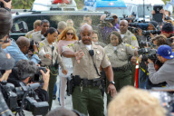 Lindsay Lohan arrives at her trial nearly an hour late