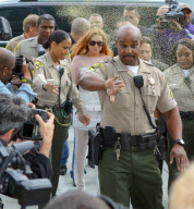Lindsay Lohan arrives at her trial nearly an hour late