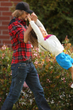 Gabriel Aubry has a hold on little Nahla's hand on his way to drop her off at school