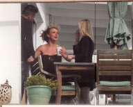 Britney Spears And Friends Smoke And Talk Outdoors On A Patio Overlooking Malibu Beach