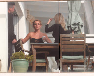 Britney Spears And Friends Smoke And Talk Outdoors On A Patio Overlooking Malibu Beach