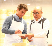 USA ONLY Tom Cruise makes steamed buns in Taiwan