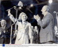 Margaret Thatcher Waves Her Ken Dodd-style Wand Of Paper And Feathers As Mp Peter Thomas Applauds. An Estatic Tory Party Yesterday Took Margaret Thatcher To Its Heart. In A Speech Hailed Justifiably As ''an Unqualified Triumph'' By The Conference Pre