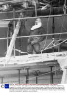 A Policeman In Protective Clothing Searching For Clues At The Grand Hotel Brighton. The Brighton Hotel Bombing Happened On 12 October 1984 At The Grand Hotel In Brighton England. The Bomb Was Planted By Provisional Irish Republican Army (ira) Member