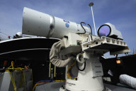 US Navy unveils sea-based laser weapon that will be deployed to Persian Gulf - Apr 2013
