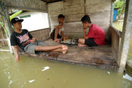 Schoolchildren forced to go to school on boats due to the overflowing Bengawan Solo river, Truni, Lamongan, Indonesia - 10 Apr 2013