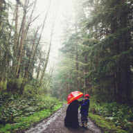 Mother photographs Julian Becker and Max the dog for his Naval officer father, Whidbey Island, Washington, America - Apr 2013
