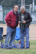 Harrison Ford shows Jim Belushi how to take a good photo
