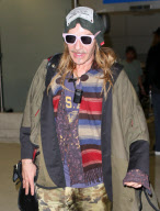 John Galliano at LAX looking homeless