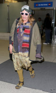 John Galliano at LAX looking homeless