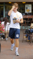EXCLUSIVE Patrick Schwarzenegger eats with his mouth open