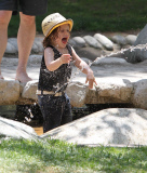 Rachel Zoe and Rodger Berman take Skyler to play in water