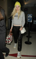 ELLE FANNING ARRIVES AT LAX