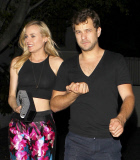 Diane Kruger shows sexy midriff while wearing very colorful pants at Chateau Marmont event