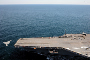 An X-47B Unmanned Combat Air System demonstrator launches from the flight deck of the aircraft carrier USS George H.W. Bush, Atlantic Ocean - 14 May 2013