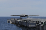An X-47B Unmanned Combat Air System demonstrator launches from the flight deck of the aircraft carrier USS George H.W. Bush, Atlantic Ocean - 14 May 2013