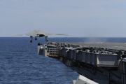 An X-47B Unmanned Combat Air System demonstrator launches from the flight deck of the aircraft carrier USS George H.W. Bush, Atlantic Ocean - 14 May 2013