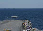 An X-47B Unmanned Combat Air System demonstrator launches from the flight deck of the aircraft carrier USS George H.W. Bush, Atlantic Ocean - 14 May 2013