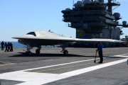 An X-47B Unmanned Combat Air System demonstrator launches from the flight deck of the aircraft carrier USS George H.W. Bush, Atlantic Ocean - 14 May 2013