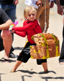 Gwen Stefani Takes The Kids To The Beach 