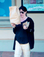 Shannen Doherty Hides Behind A Bag