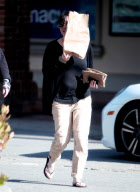 Shannen Doherty Hides Behind A Bag