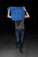 Adam Lambert is feeling camera shy at ArcLight