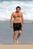 *EXCLUSIVE* Bradley Cooper shows off his beach body in Rio