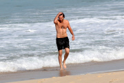 *EXCLUSIVE* Bradley Cooper shows off his beach body in Rio