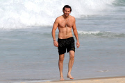 *EXCLUSIVE* Bradley Cooper shows off his beach body in Rio