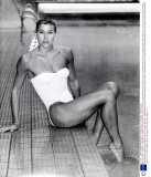Sharron Davies - Swimmer - 1989 Swimmer Sharron Davies Launches Freeman's Summer 1989 Swimwear At The Oasis Sports Centre Which Boats The Only Heated Outdoor Swimming Pool In London. This Coral Strapless Ribbed Tube Swimsuit With Back Bow Detail Is