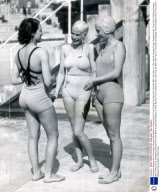 At Brighton Bathing Pool There Were Graceful Girl Bathers In Rows And Far From Finding The Sea Cold They Sat With Their Feet In It. But (left) At Hastings Farther Eastward Only Three Girls In Bathing Costume Were To Be Found.