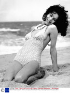 Model Poses In Dorothy Perkins One-piece Bikini.