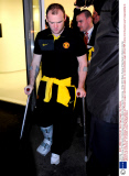 Wayne Rooney of Manchester United leaves on crutches, Allianz Arena, Munich, Germany - 30 Mar 2010