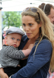 Elizabeth Berkley And Son Sky On The Set Of "Extra TV"
