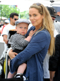 Elizabeth Berkley And Son Sky On The Set Of "Extra TV"