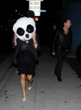 Julian Lennon with a Panda head girlfriend