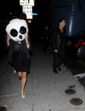 Julian Lennon with a Panda head girlfriend