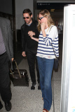 Engaged couple Kate Bosworth and Michael Polish touch down in LA