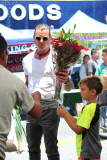 Gavin and Kingston pick out flowers at the Farmers Market for Father's Day