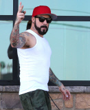 EXCLUSIVE - A. J. McLean wearing a baseball cap over his new hair