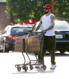 EXCLUSIVE - A. J. McLean wearing a baseball cap over his new hair