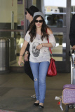 Lucy Hale Arriving at LAX with a smile looking grunge cute