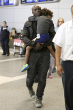 Seal with a smile and the Kids Arriving at LAX