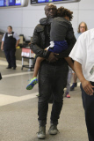 Seal with a smile and the Kids Arriving at LAX